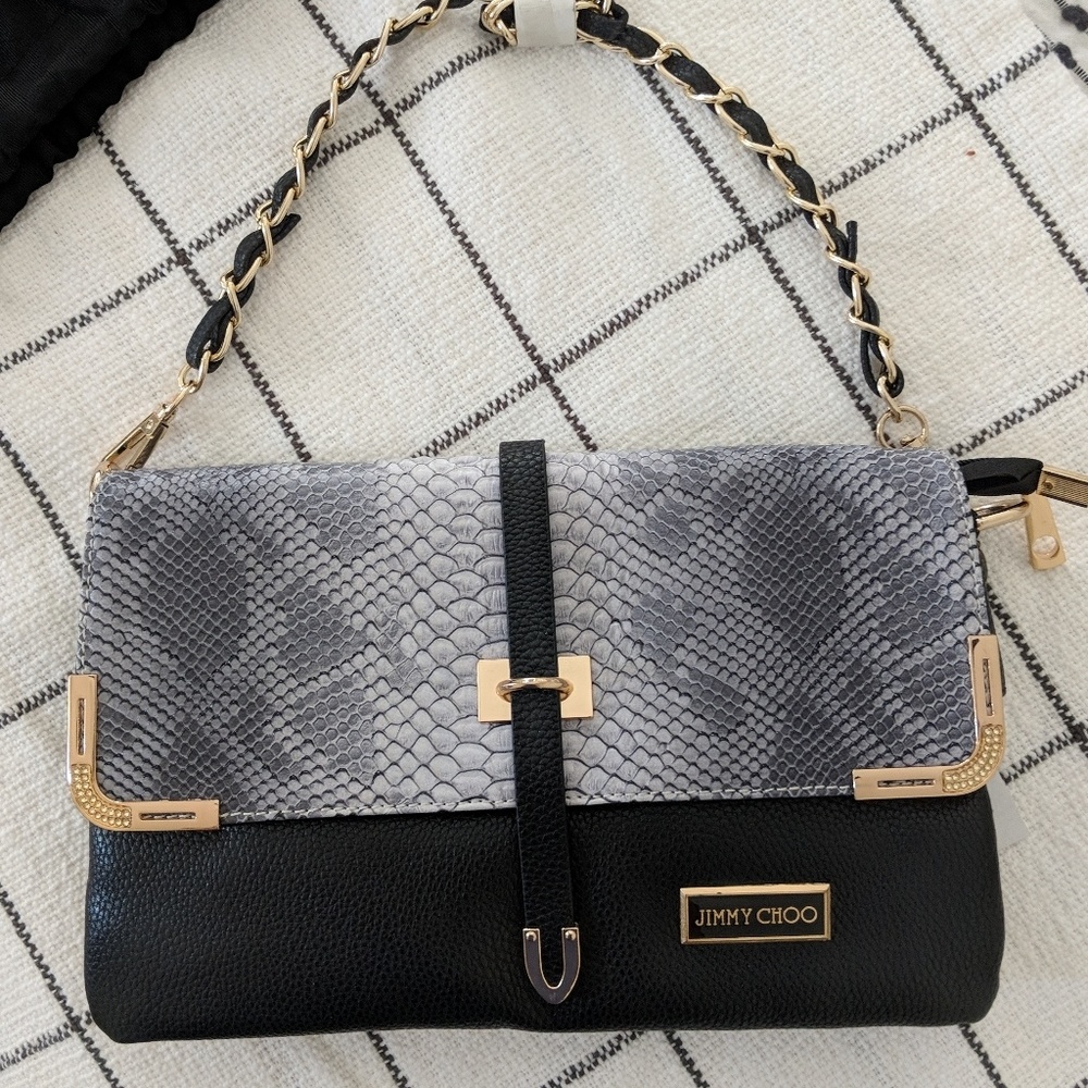 Faux snakeskin and leather handbag